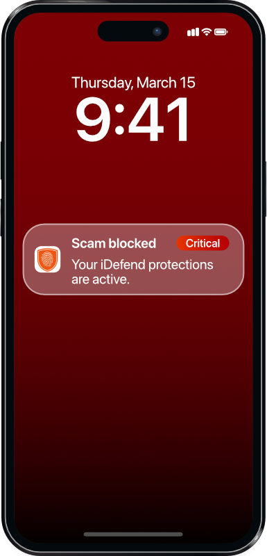 An iDefend critical alert that reads "Scam blocked. Your iDefend protections are active."